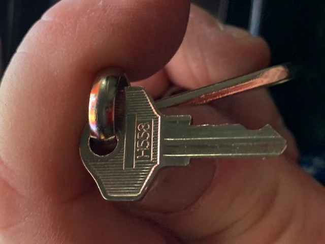 The very small reset key on the other side