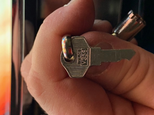 The very small reset key on one side